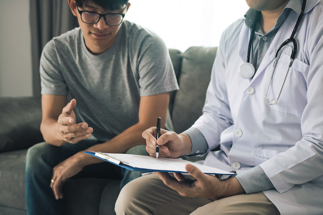 Student meeting meeting with a behavioral health consultant