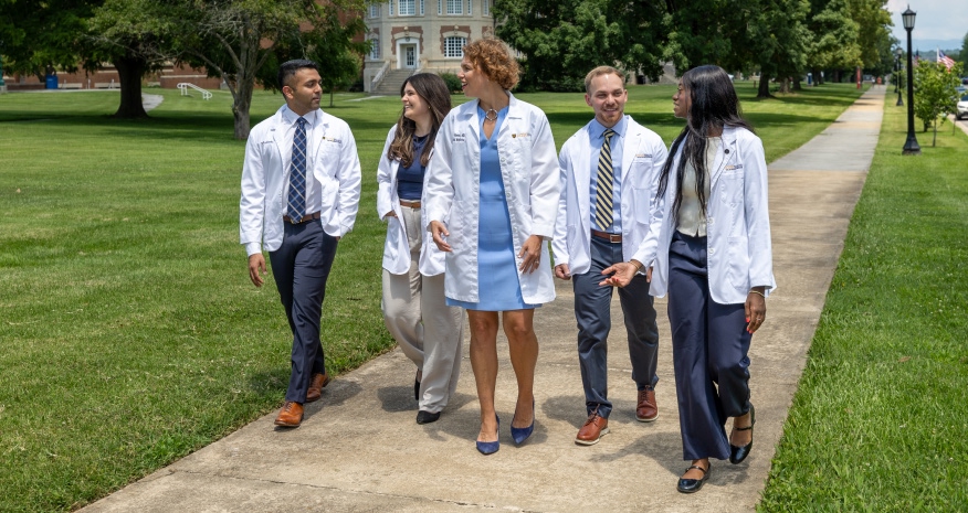 Dr. Reece and Students Walking