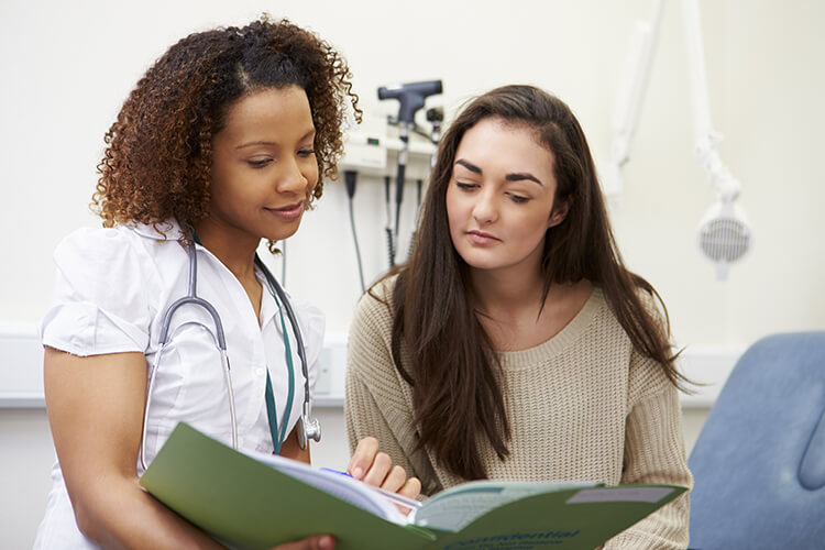 Photo of female patient with provider